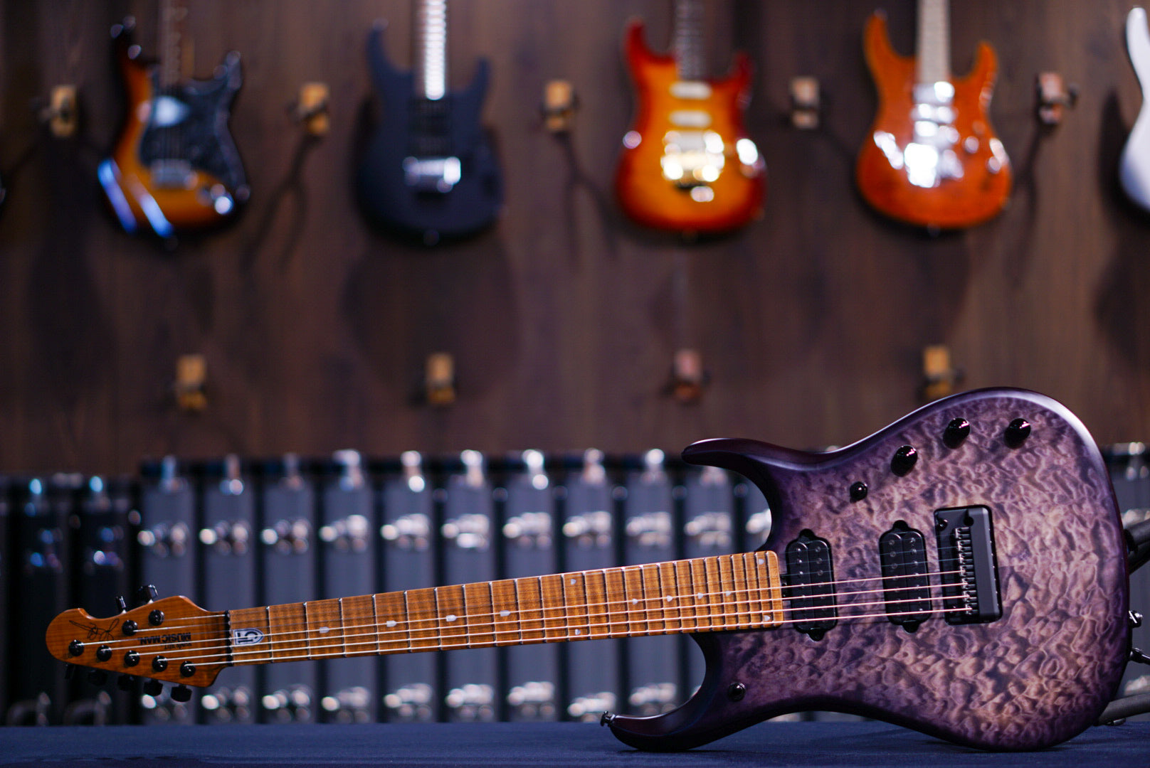 ERNIE BALL MUSICMAN JP 15 7 STRING TRANS BLACK QUILT TOP K03268