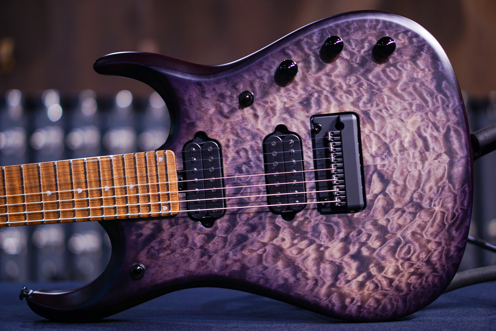 ERNIE BALL MUSICMAN JP 15 7 STRING TRANS BLACK QUILT TOP K03268