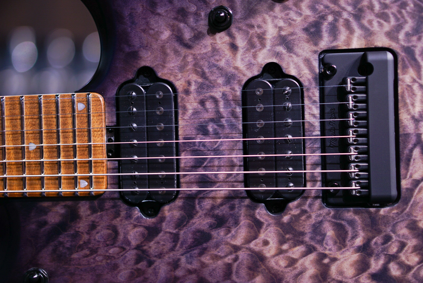 ERNIE BALL MUSICMAN JP 15 7 STRING TRANS BLACK QUILT TOP K03268