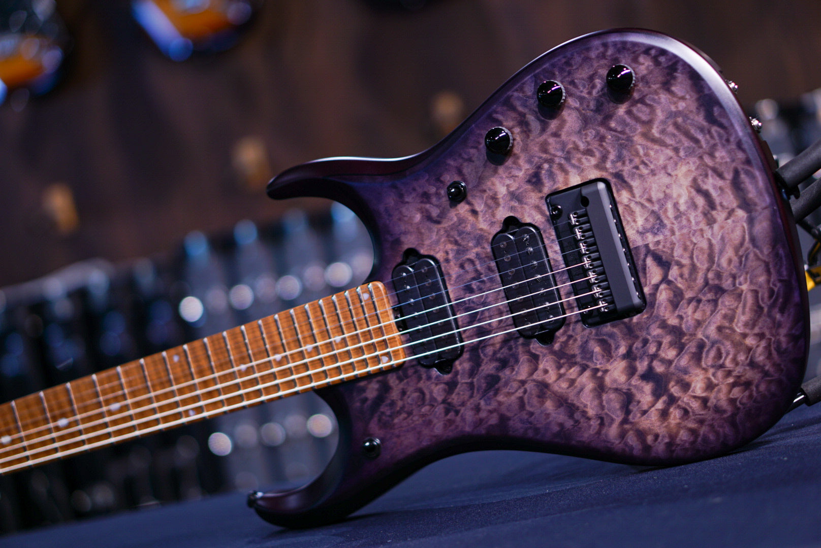 ERNIE BALL MUSICMAN JP 15 7 STRING TRANS BLACK QUILT TOP K03268