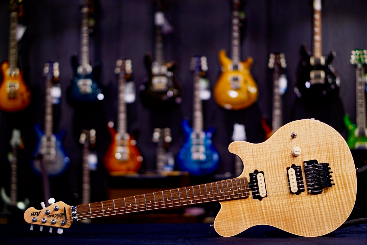 Ernie Ball Music Man Axis - Natural Gloss Flame - Maple G81262