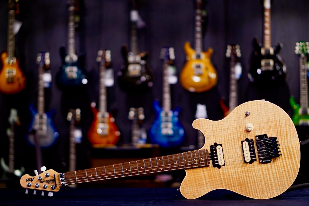 Ernie Ball Music Man Axis - Natural Gloss Flame - Maple G81262