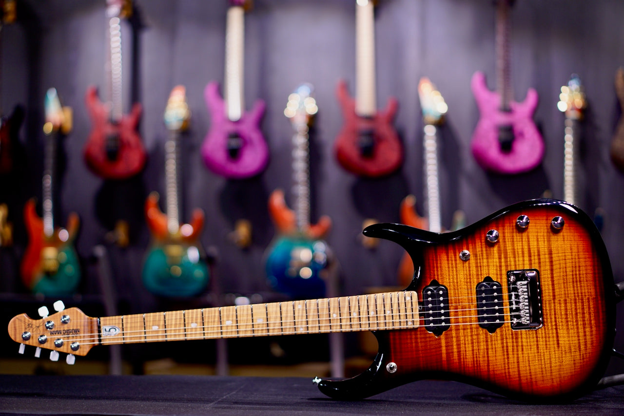 Ernie Ball Music Man JP 15 6 string  Tiger Eye Flame Top H06325